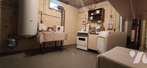 Maison de ville semi-mitoyenne.