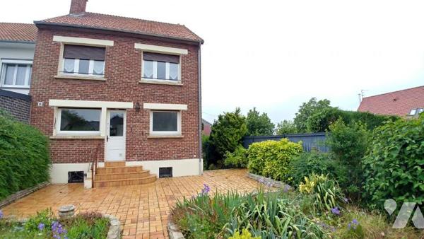 Maison de ville semi-mitoyenne.