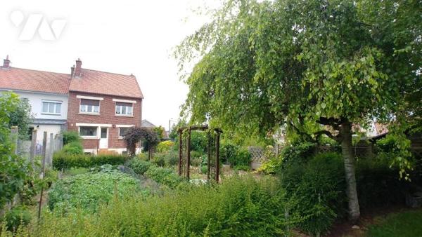 Maison de ville semi-mitoyenne.