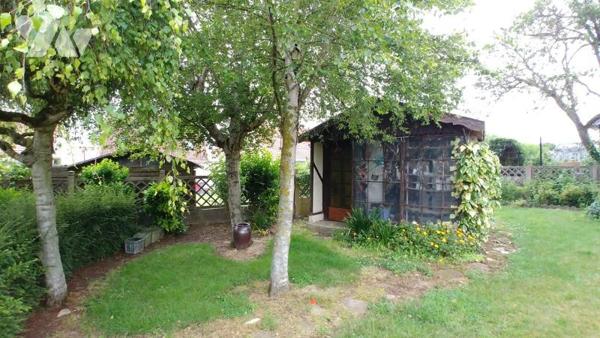 Maison de ville semi-mitoyenne.