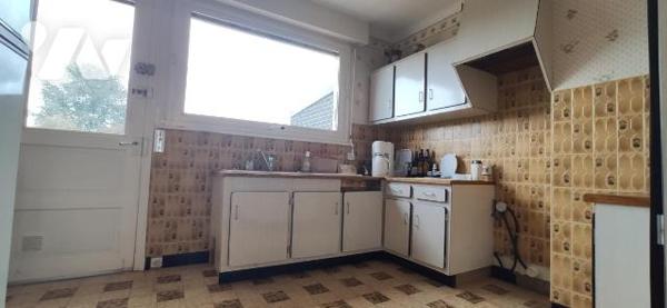 Maison de ville semi-mitoyenne.