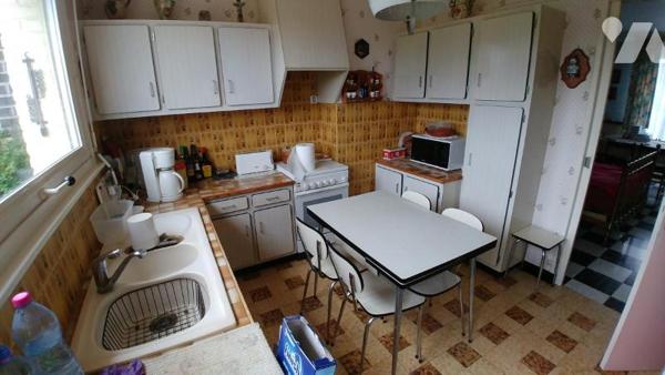 Maison de ville semi-mitoyenne.