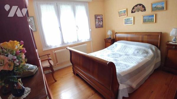 Maison de ville semi-mitoyenne.