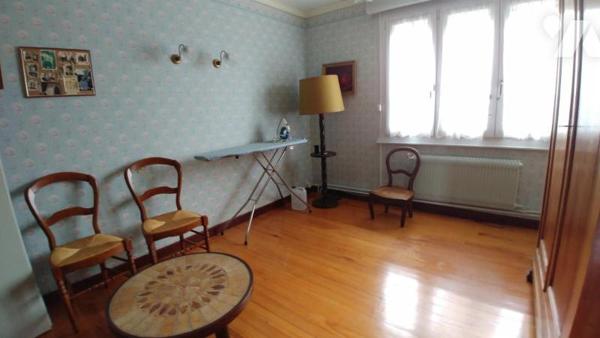 Maison de ville semi-mitoyenne.