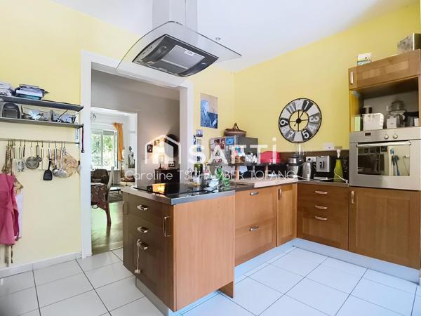 Magnifique appartement de 136m² avec jardin, cave et garage