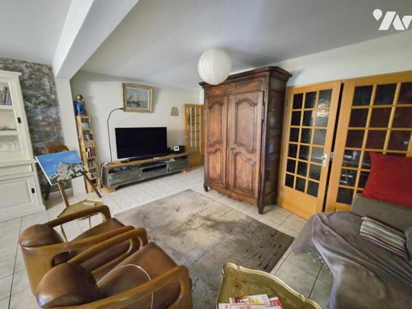 Appartement de 116m2 avec jardin et garage 