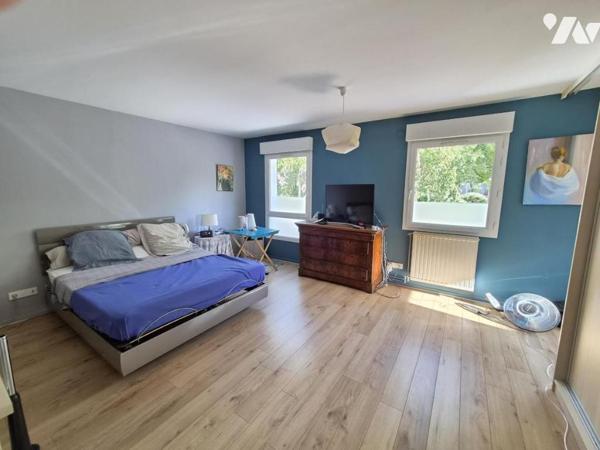 Appartement de 116m2 avec jardin et garage 