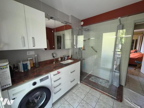 Appartement de 116m2 avec jardin et garage 