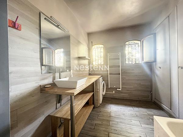 Appartement a vendre a Saint Genis Des Fontaines 4 pieces 104 m2 avec terrasse, jardin et parking