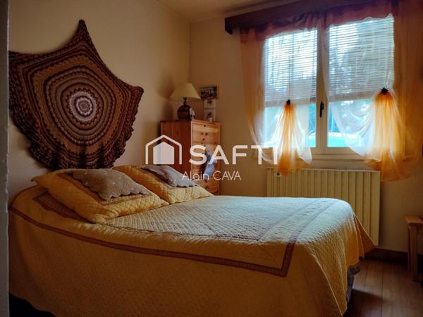 Appartement T2 de 43m² en rez de chaussée avec balcon, cave et petit jardin commun