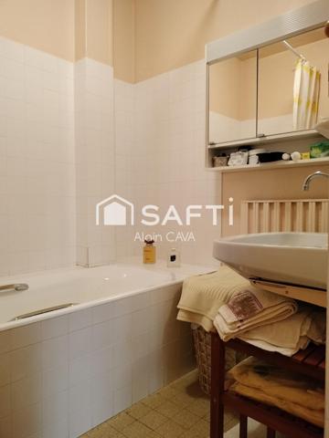 Appartement T2 de 43m² en rez de chaussée avec balcon, cave et petit jardin commun