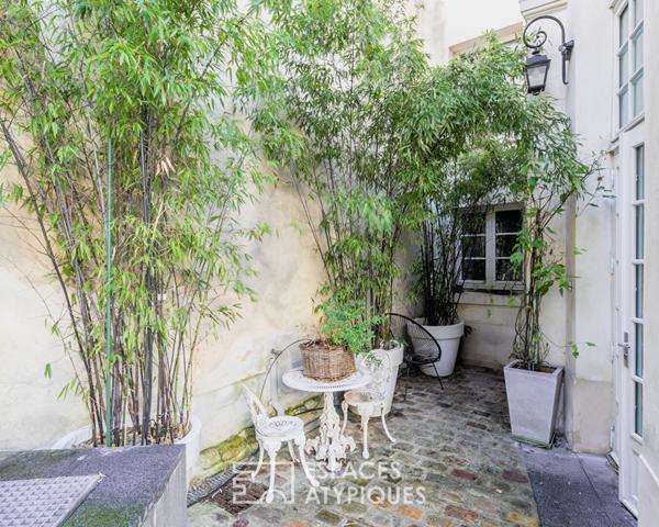 Triplex avec terrasse dans un hôtel particulier