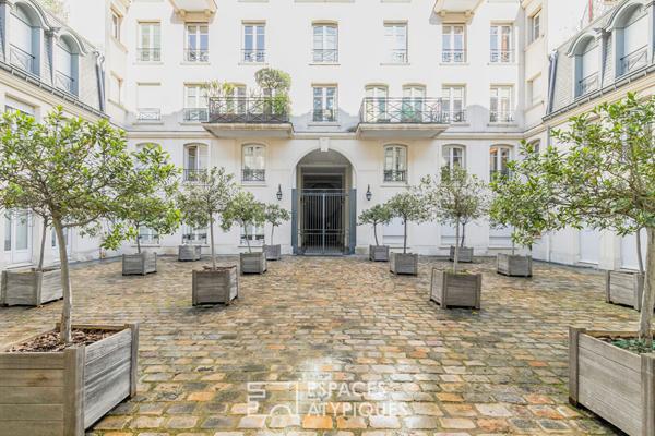 Triplex avec terrasse dans un hôtel particulier