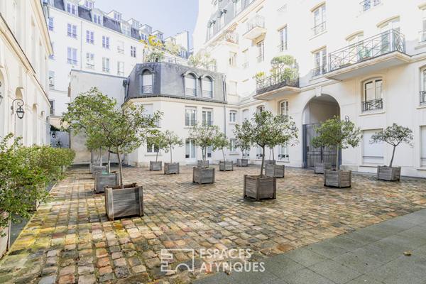 Triplex avec terrasse dans un hôtel particulier