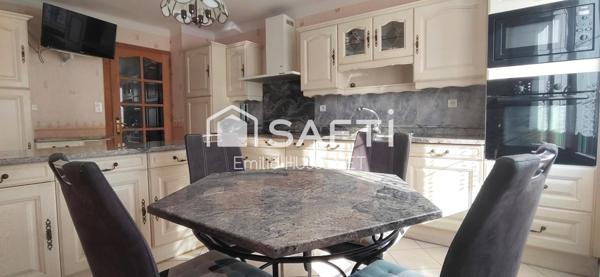 Maison spacieuse avec local commercial