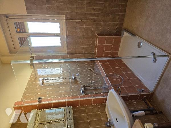 Maison de ville de 134 m², a proximité de l'Hôpital et des lycées.