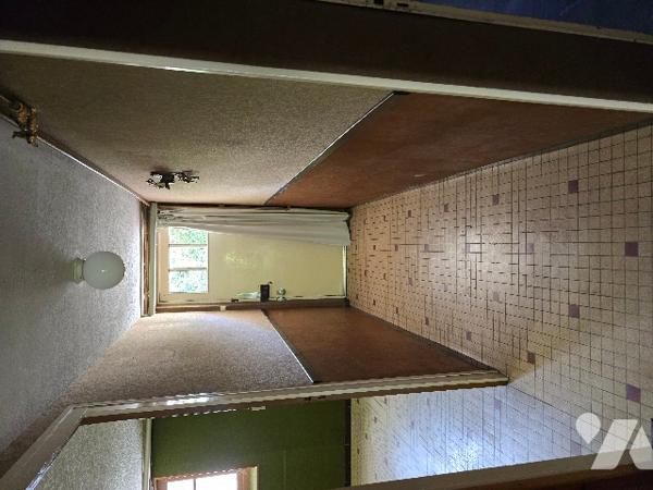 Maison de ville de 134 m², a proximité de l'Hôpital et des lycées.