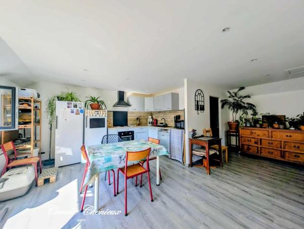 Ensemble de deux maisons dans un cadre verdoyant