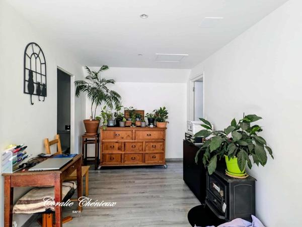 Ensemble de deux maisons dans un cadre verdoyant