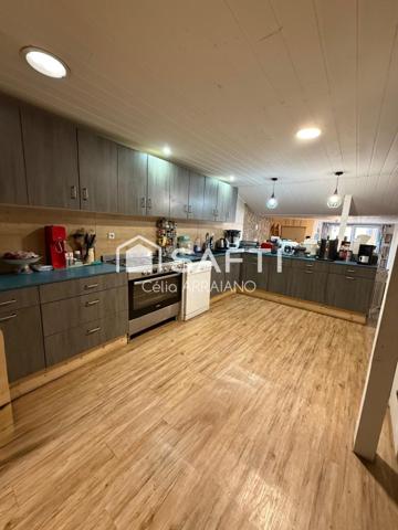MAISON FAMILIALE  + DOUBLE GARAGE ET PETIT JARDIN