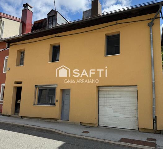 MAISON FAMILIALE  + DOUBLE GARAGE ET PETIT JARDIN