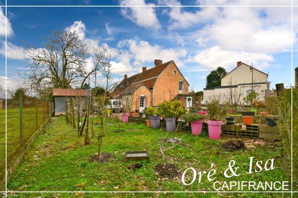 Maison de bourg avec jardin arboré NERONDES (18)