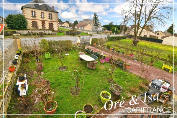 Maison de bourg avec jardin arboré NERONDES (18)