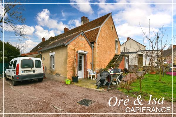 Maison de bourg avec jardin arboré NERONDES (18)