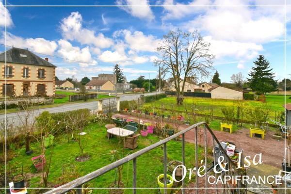 Maison de bourg avec jardin arboré NERONDES (18)