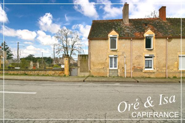 Maison de bourg avec jardin arboré NERONDES (18)