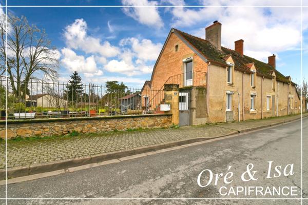 Maison de bourg avec jardin arboré NERONDES (18)