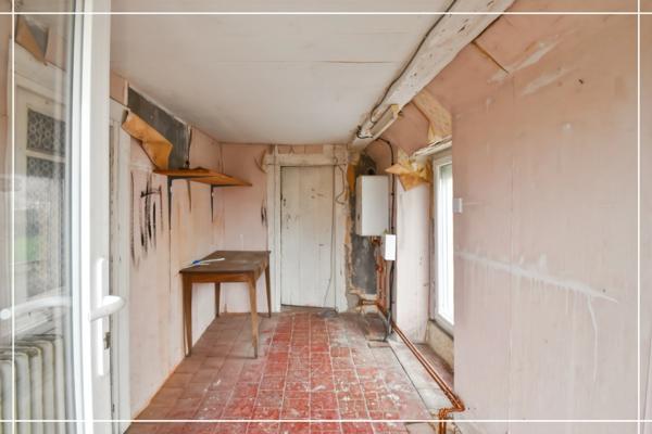 Maison de bourg avec jardin arboré NERONDES (18)