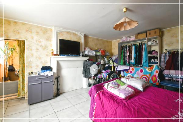 Maison de bourg avec jardin arboré NERONDES (18)