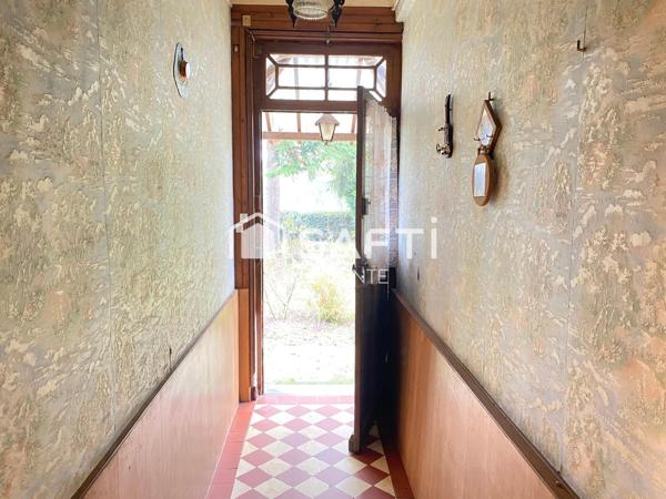 Maison en briques avec une dépendance