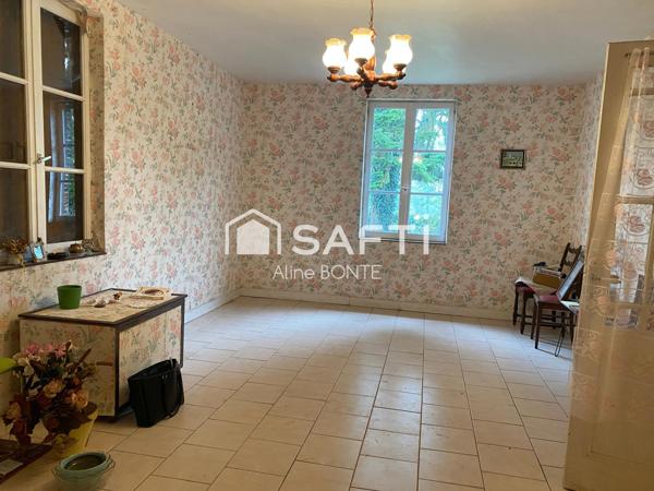 Maison en briques avec une dépendance
