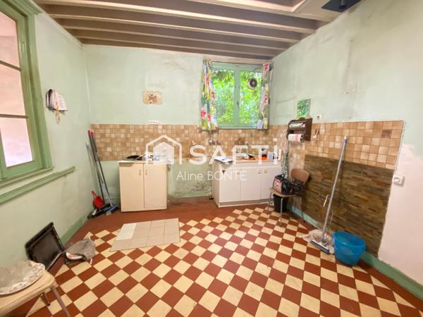 Maison en briques avec une dépendance