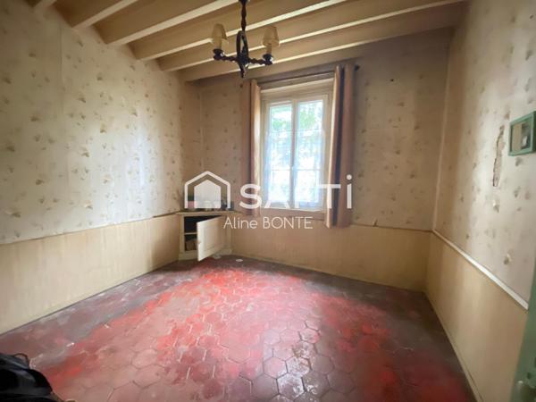 Maison en briques avec une dépendance
