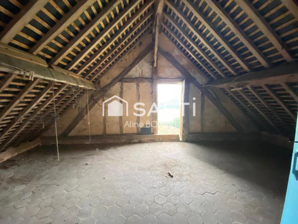Maison en briques avec une dépendance