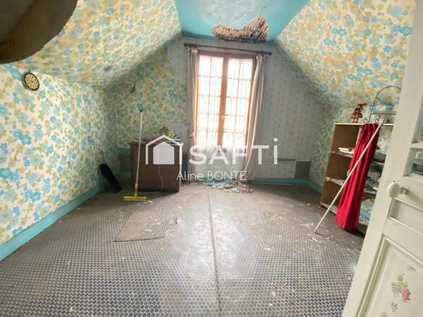 Maison en briques avec une dépendance