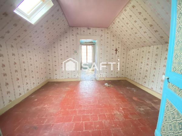 Maison en briques avec une dépendance