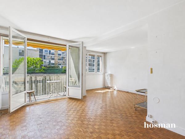 Appartement 3 pièces de 65 m² avec balcon, box et cave - Paris 20