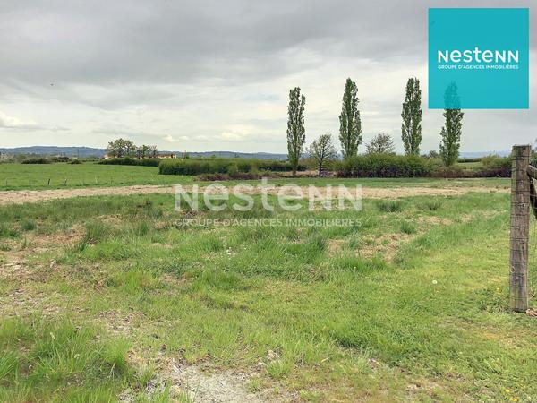 15 minutes de Feurs, 10 min accès autoroute, terrain constructible à Saint-georges-de-baroille de 1215 m2