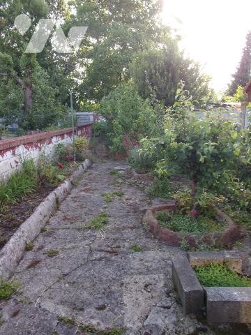 Maison semi-individuelle avec garage