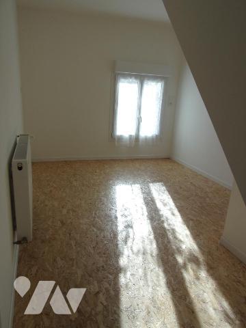 Maison semi-individuelle avec garage