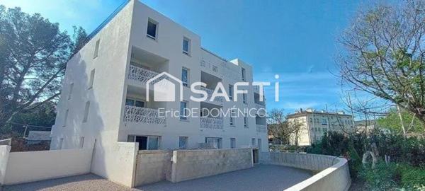 T2 avec balcon, parking, NRT2012 à 5mn du port