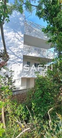 T2 avec balcon, parking, NRT2012 à 5mn du port