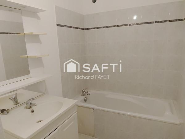 Immeuble centre de Jonzac avec jardin