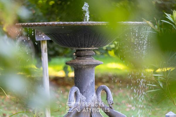 Propriété en pierre dans son parc arboré