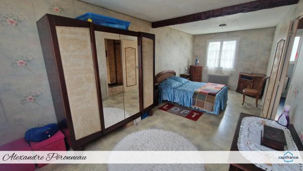 Maison familiale avec beau jardin plein sud – 4 chambres, garage – Travaux à prévoir