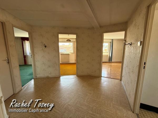 Appartement  BELFORT - BEAU POTENTIEL POUR CE T4 TRAVERSANT de 94m² -  BALCON et GARAGE !!